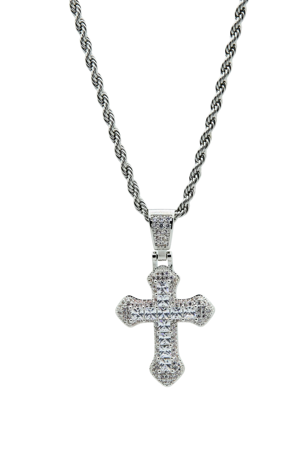 Silver cross pendant necklace on a light gray background